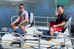 Two boys ready to go fishing on the Sport