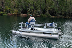 Foot controlled motor operated from the front of the boat