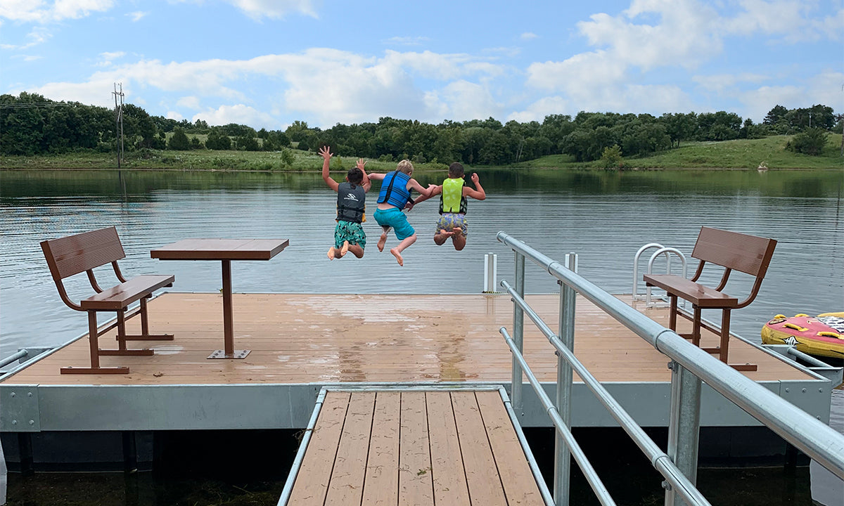 Kids jumping off dock