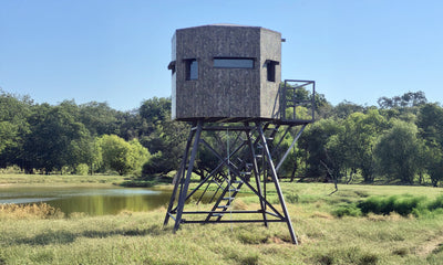 8x8 Deer blind on 10 foot tower next to pond