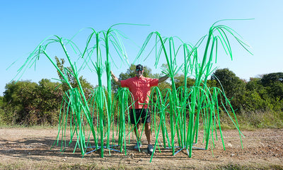 Man standing between two tower habitat products