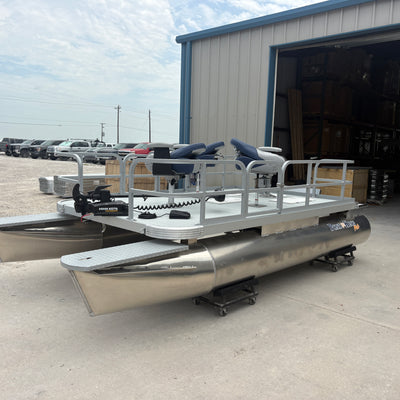 In the front attached is the Minn Kota PowerDrive 55lb. Lying beneath that are the 2 additional pontoon steps. 