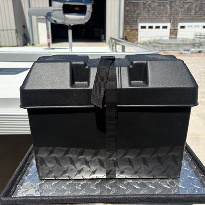 Sitting on the back tray is our black plastic battery box. 