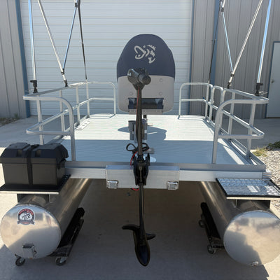 On the rear mount is the 55 lb MinnKota Endura Max w/ 42" shaft. Sitting on the left back tray is our black battery box. 