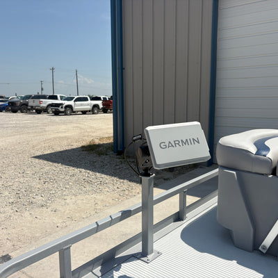 Mounted on the pedestal and ram mount is the Garmin EchoMap 7 Fish Finder.