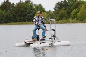 Man fishing on Rebel pond boat