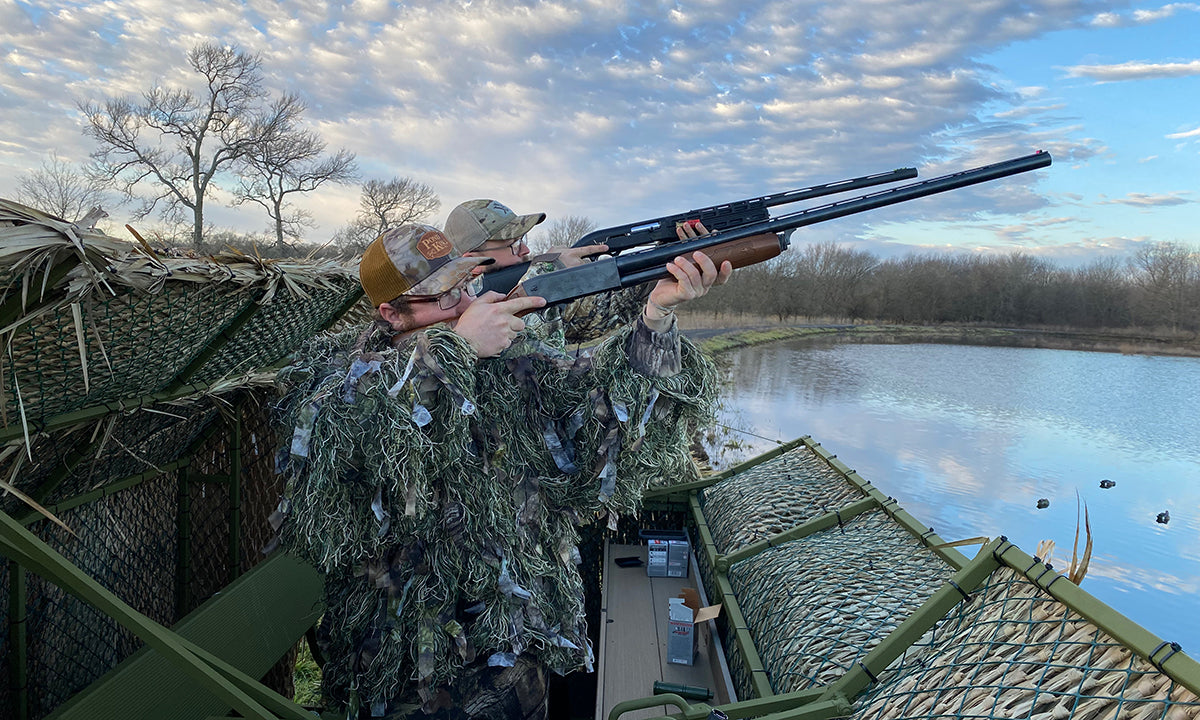 2 hunters in duck blind