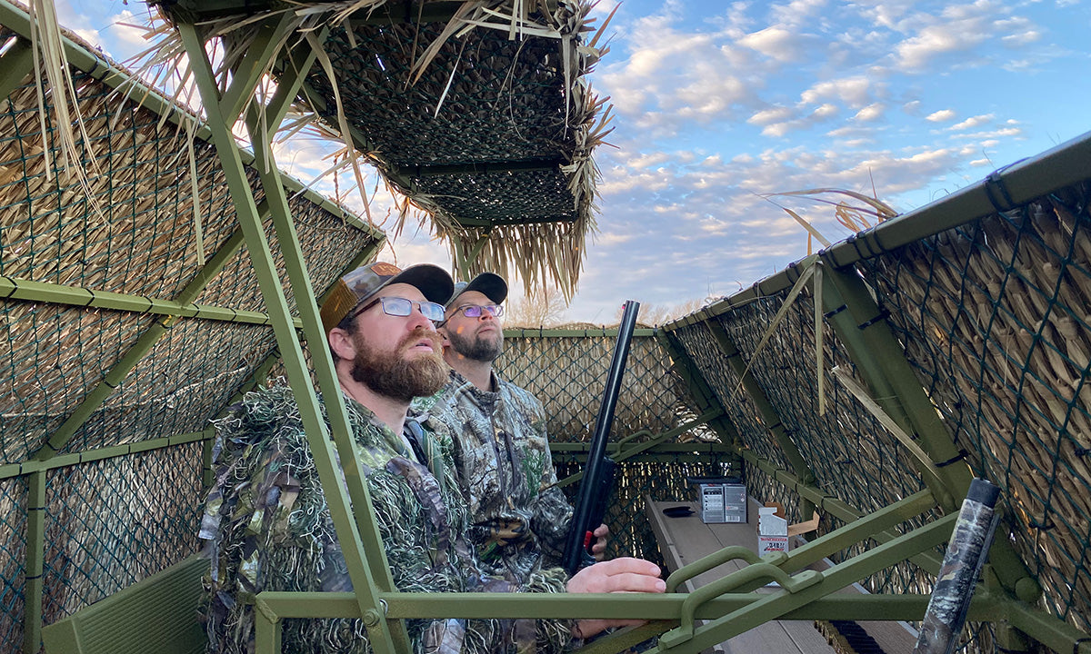 hunters in blind looking up