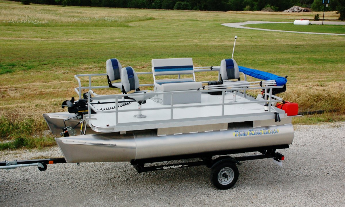 Pond King Ultra with 3 pedestal seats, a bench seat, extended railing and bimini top