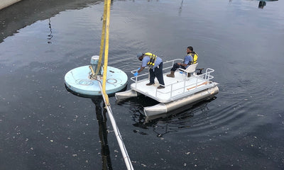 Two guys on Sport pontoon boat as work platform