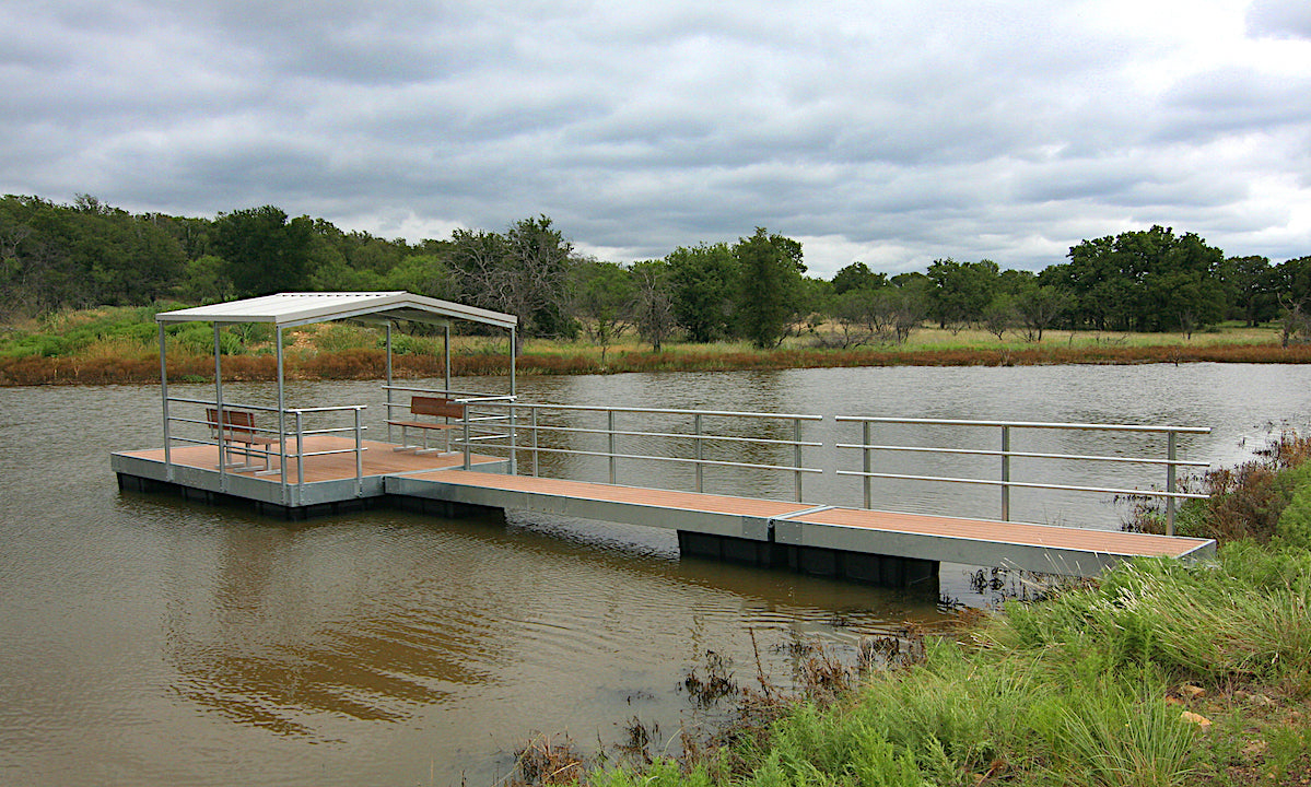 floating dock with awning and two benches