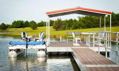 Deluxe floating dock with red awning and railing on one-side