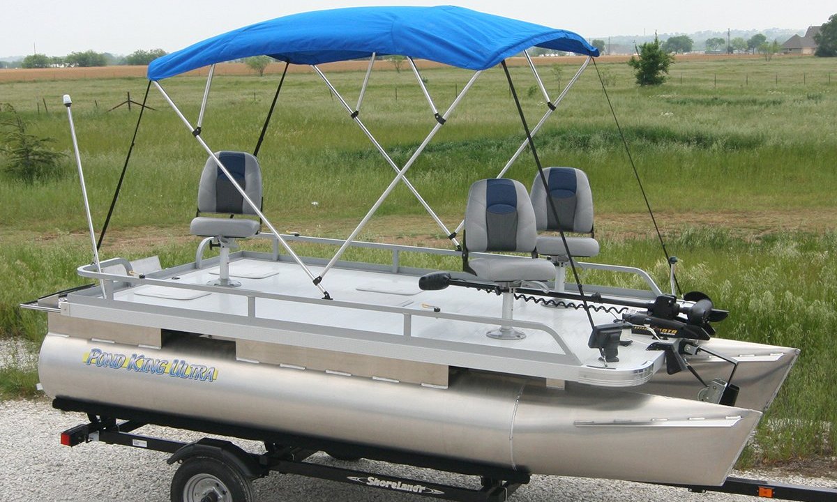 Fishing boat with trolling motor and bimini top